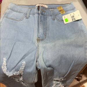 Vibrant High Rise Light Blue Distressed Jeans